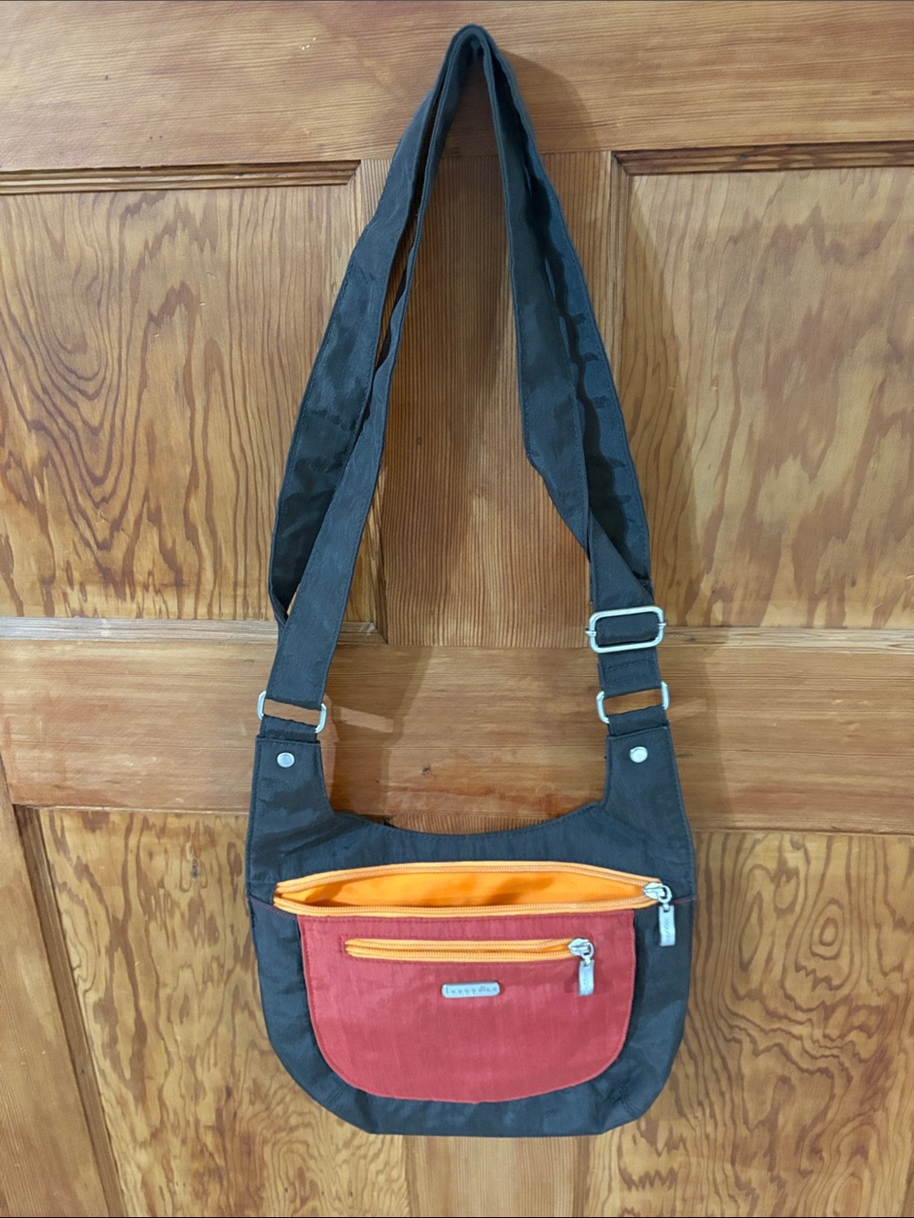 baggallini brown  Crossbody Bag with Orange and Red Accents
